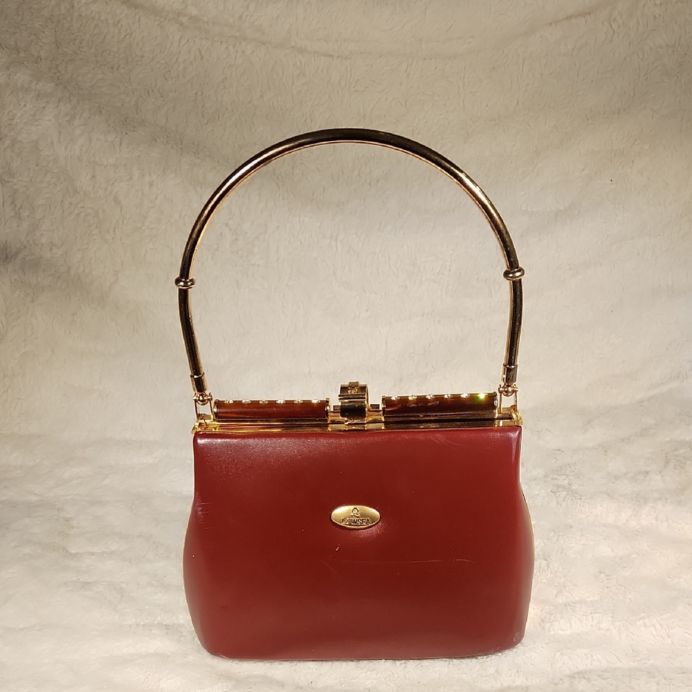Elegant Brown Handbag with Gold Accents